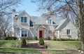 Large House with White Shake Siding and Bay Window Royalty Free Stock Photo