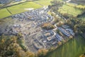 Large housing development aerial view in construction on rural countryside site Scotland UK