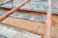 A large huge ditch pit tunnel with reinforcing structures from thick iron pipes of beams and structures at the construction site Royalty Free Stock Photo