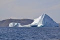 Large icebergs in bay outside St. John\'s with Signal Hill on the horizon