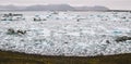 Large icebergs detached from the tongue of a glacier reaching the coast, in Iceland, paradise for adventurers