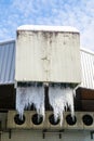 Large icicles hanging from industrial drains