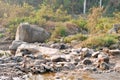 Large Igneous River Boulders and rocks has been carried by the river on the remote mountain place. Rangbang river mountain valley. Royalty Free Stock Photo