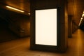 Empty illuminated lightbox mockup next to escalatorâmall signage stock photo Royalty Free Stock Photo