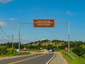 Large image of a Thank You For Visiting road sign in a small town in the countryside of Brazil Royalty Free Stock Photo