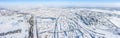 Large industrial area of the city in chilly winter day. panoramic aerial view Royalty Free Stock Photo