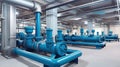 Large industrial boiler room and water treatment facility, blue pumps, shiny stainless metal pipes, and valves Royalty Free Stock Photo