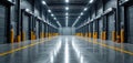 Large industrial warehouse interior features multiple loading bay doors, bright fluorescent lighting. Polished concrete floor Royalty Free Stock Photo