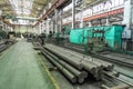 Large industrial workshop factory interior with machines, lathes and steel pipes for processing metal production Royalty Free Stock Photo