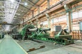 Large industrial workshop factory interior with machines, lathes and steel pipes for processing metal production Royalty Free Stock Photo