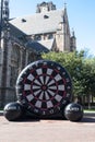 Large inflatable dart board in the street for fair style games entertainment