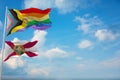 large Inter Progress Pride flag and flag of Florida state, USA waving at sky. Freedom and love, activism, community concept. Pride