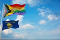 large Inter Progress Pride flag and flag of Montana state, USA waving at sky. Freedom and love, activism, community concept. Pride