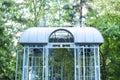 Large iron blue gazebo for relax outdoor. Wedding decorations. exterior Romantic alcove. Decor autumn terrace. Royalty Free Stock Photo