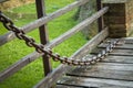 Large iron chain on an old castle bridge close up Royalty Free Stock Photo