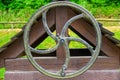 Large iron wheel for the well