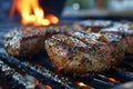 Large juicy beef rib eye steak on a hot grill