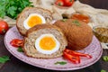 Large juicy cutlets stuffed with boiled egg