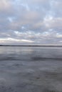 a large lake in winter in the morning during sunrise Royalty Free Stock Photo