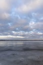 a large lake in winter in the morning during sunrise Royalty Free Stock Photo