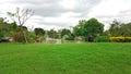 Large Lawn in garden with pond and fountain