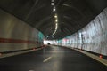 large lighted tunnel and road