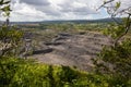 Large limestone quarry in Clitheroe, Ribble valley. Excavators and trucks working