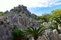 Large limestone rock formations in Daisekirinzan park in Okinawa