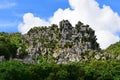 Large limestone rock formations in Daisekirinzan park in Okinawa