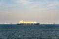 Large liquefied natural gas LNG carrier with 4 LNG tanks fleet sail in the sea