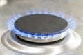 Large lit gas hob with blue flame Royalty Free Stock Photo