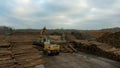 A large loader of logs at a sawmill of coniferous trees Royalty Free Stock Photo