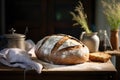 a large loaf of bread is sitting on a wooden board