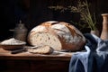 a large loaf of bread is sitting on a wooden board