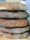 Large loaves of genuine Apulian bread for sale in Italian bakery