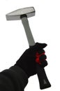 Large locksmith hammer held in left hand in thin black nylon/spandex glove with red outline, white background