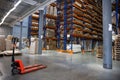 Large Logistics hangar warehouse with lots shelves or racks with pallets of goods. Industrial shipping and cargo delivery Royalty Free Stock Photo