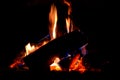 large logs burn Red and blue flames Royalty Free Stock Photo