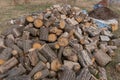 Large lumber sawed log stacked firewood wood lumber timber stack logs pile, wood lumber Royalty Free Stock Photo