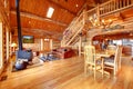 Large luxury log house living room. Royalty Free Stock Photo