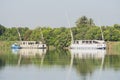 Large egyptian river cruise dahabeya boat moored on Nile bank Royalty Free Stock Photo