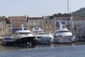 Large luxury yacht anchored in the Port of St Tropez, South of France. Royalty Free Stock Photo