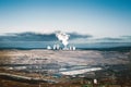 A large marble quarry with a power station in the background. Industrial area Royalty Free Stock Photo