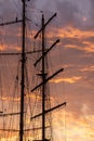 Large Masts Of An Old Sailing Ship At Sunset
