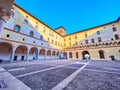 The large medieval Rocchetta square courtyard with pebble floor, Sforza`s Castle in Milan, Italy Royalty Free Stock Photo