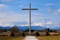 Large metal cross at Brezje and mountain Triglav in Julian alps, Gorenjska Royalty Free Stock Photo