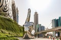 Large metal hand showing V - Victory near the Museum of The Future in Dubai city, United Arab Emirates