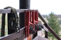 large metal locking carabiners with rope, climbing gear hanging on the store room. Height safety harness and arborist Royalty Free Stock Photo