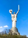 Large metal statue of Motherland in Ukraine with a shield and a sword, view from the back. Ukraine, Kiev, April 17, 2019 Royalty Free Stock Photo