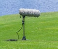 A large microphone boom with stand.